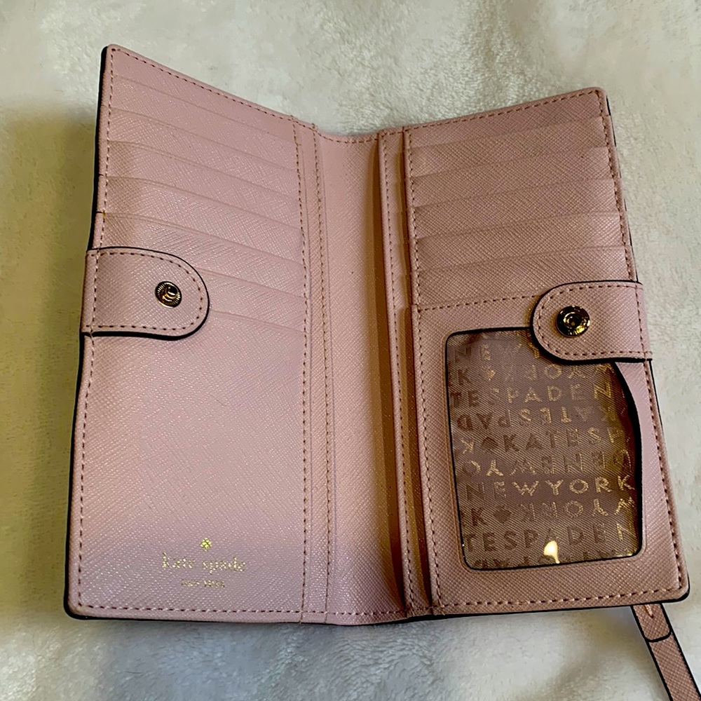 Pink Kate Spade wallet with pink glitter polka dots.  Credit card holder inside